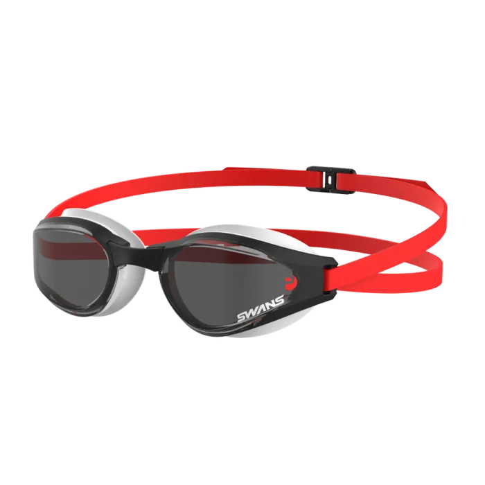 A pair of Ascender open water goggles with polarized/smoke lenses, featuring a red and black silicone strap.