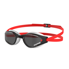 A pair of Ascender open water goggles with polarized/smoke lenses, featuring a red and black silicone strap.